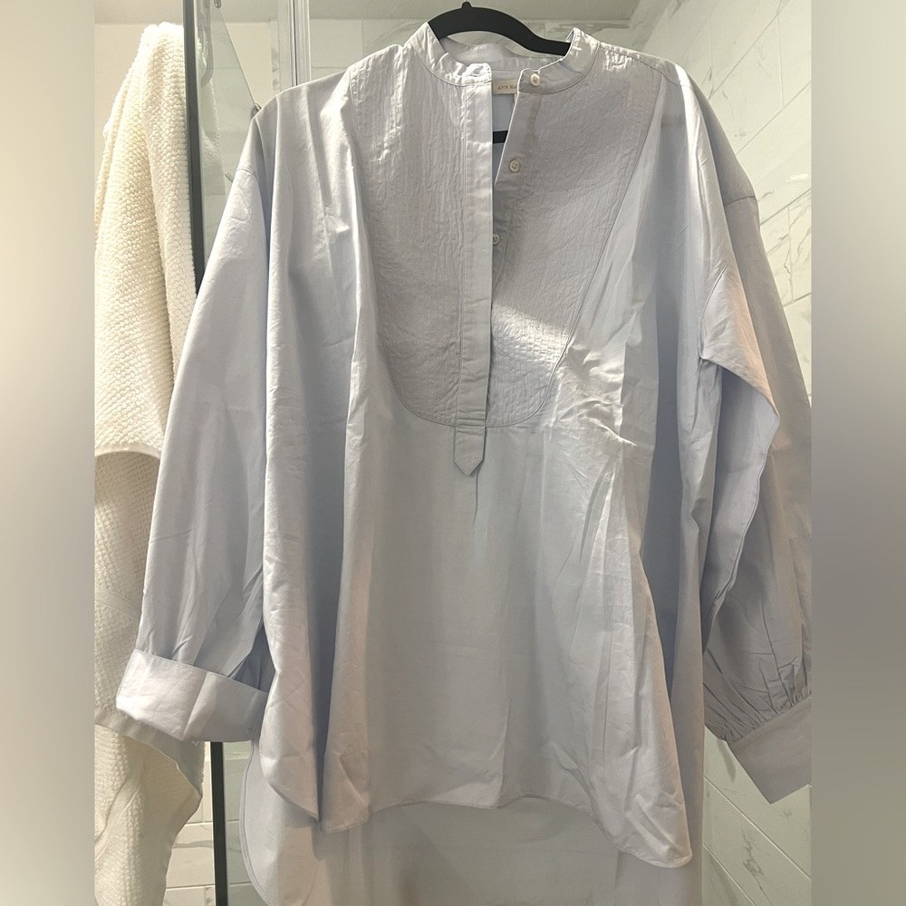 Ann Mashburn bib front shirt in light blue.